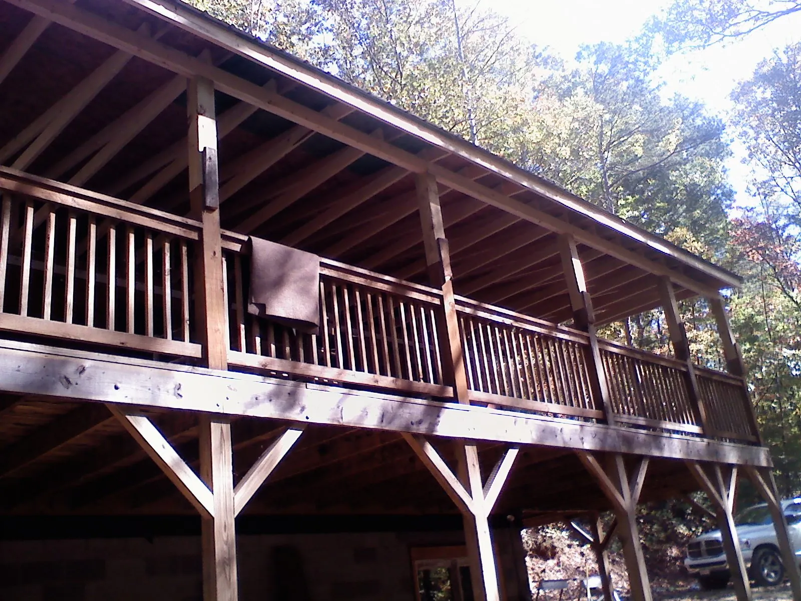 Timber framing under a new elevated porch and deck — Roof Leak Repair in De Soto by Roofing Brothers